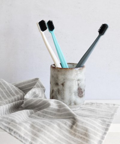 GRIN CHARCOAL-INFUSED BIODEGRADABLE TOOTHBRUSH